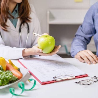 Nutritionist giving consultation to patient with healthy fruit and vegetable, Right nutrition and diet concept